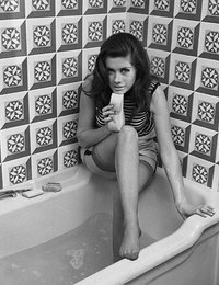 Neat gals have nice time posing in the bathtubs in their favorite vintage lingerie right on these pics