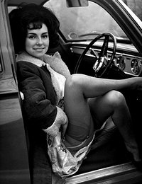 Retro lingerie pictures featuring stunning gals show their neat legs at and inside the cars
